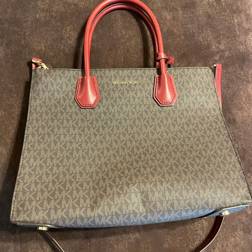 Michael Kor’s bag brown and dark red